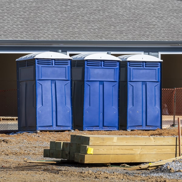 what is the cost difference between standard and deluxe porta potty rentals in Doss